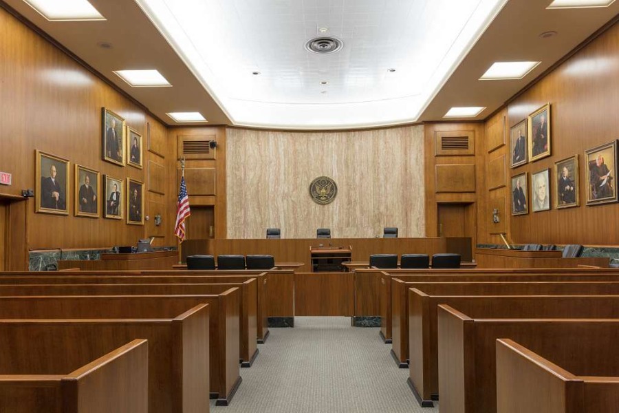 Picture showing the inside of a courtroom in the E. Barrett Prettyman Federal Courthouse